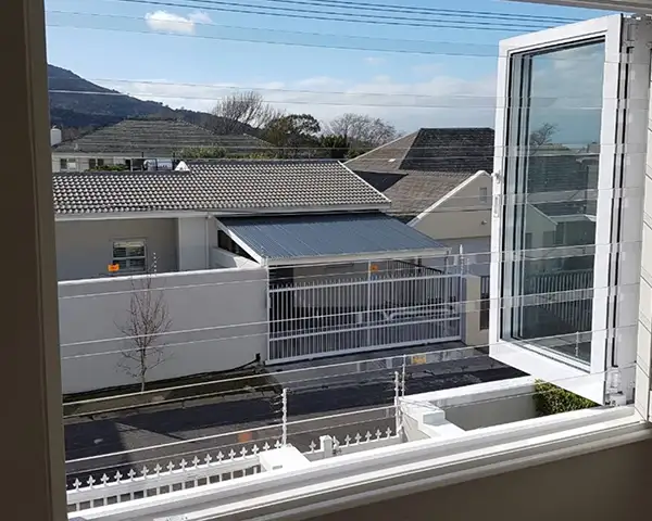 SheerGuard clear burglar bars installed on student accommodation windows in Stellenbosch